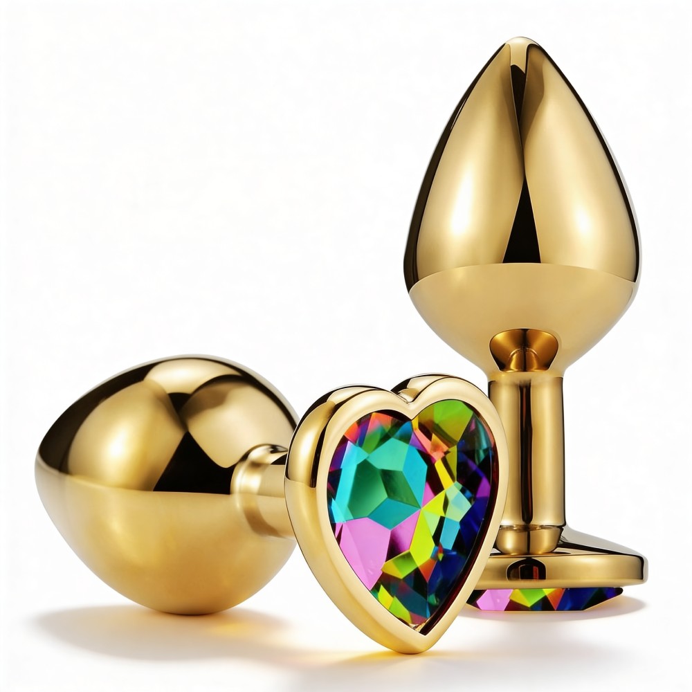 Анальні іграшки без вібрації - Анальна пробка ALUME, S, металева золотиста з різнокольоровим каменем у формі серця, 7 х 2,8 см
