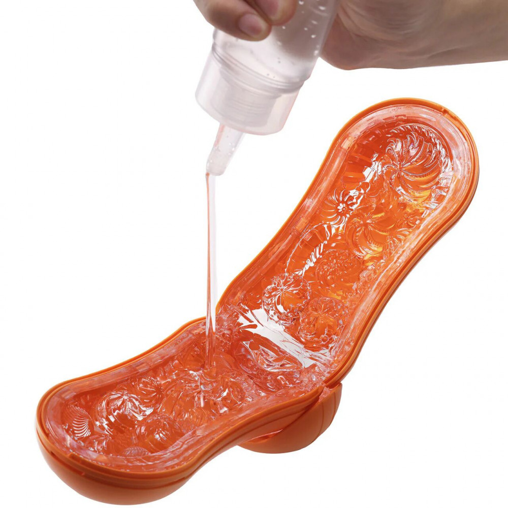 Мастурбаторы без вибрации - Мастурбатор Tenga Flip Orb — Sunset Orange, с изменяемым сжатием, со стимулирующими шариками внутри 4