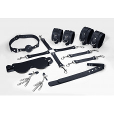 Набор Feral Feelings BDSM Kit 7 Black, наручники, поножи, коннектор, маска, паддл, кляп, зажимы