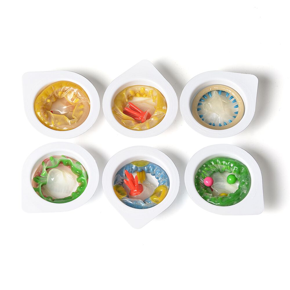 Ерегційні кільця без вібрації - Насадка на член Recare Spike Condom Pink (презерватив з кульками та рядами шипів) 5