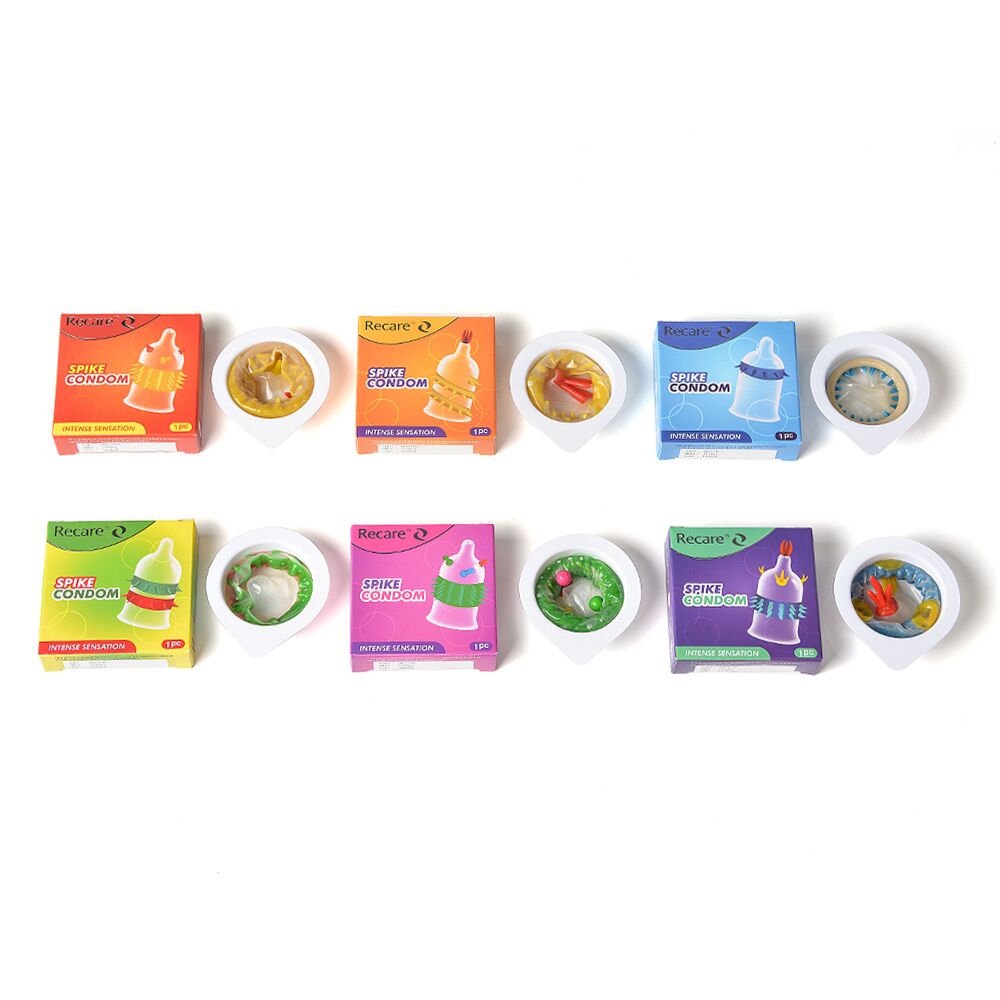 Ерегційні кільця без вібрації - Насадка на член Recare Spike Condom Pink (презерватив з кульками та рядами шипів) 4