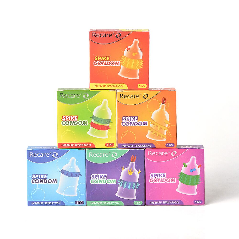 Эрекционные кольца без вибрации - Насадка на член Recare Spike Condom Orange (презерватив с усиками и шипами) 7