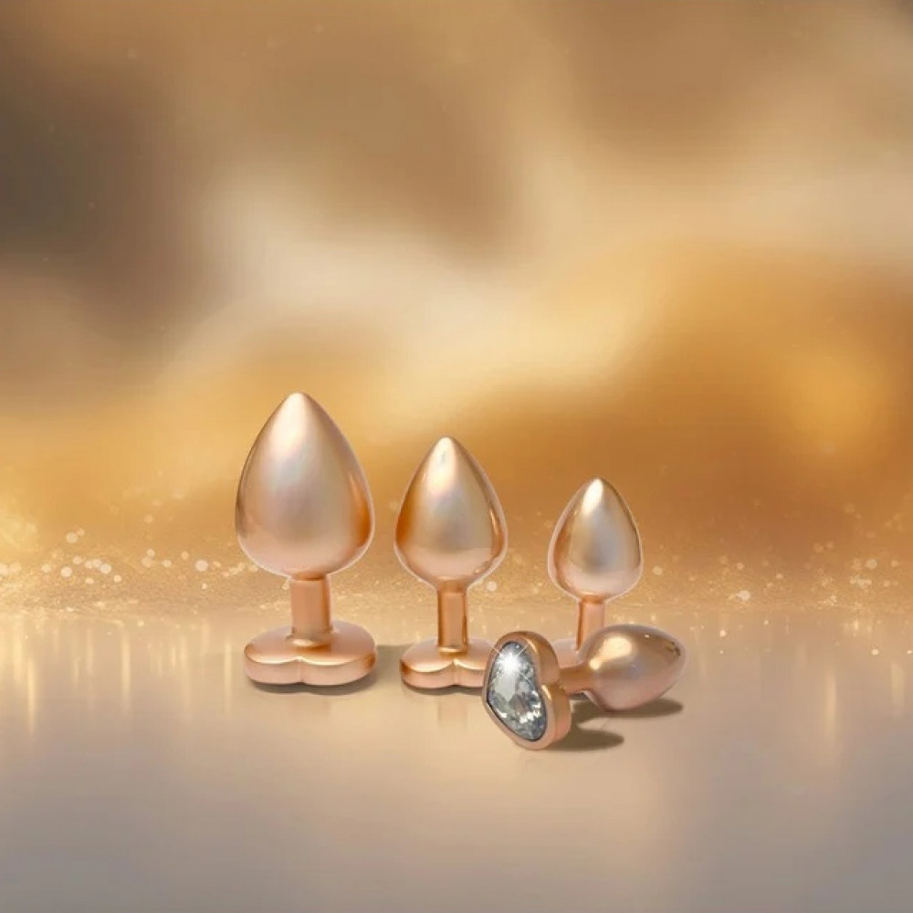 Анальные игрушки без вибрации - Набор из трёх анальных пробок Dream Toys Gleaming Love, размеры S, M, L, перламутрово-золотые 4